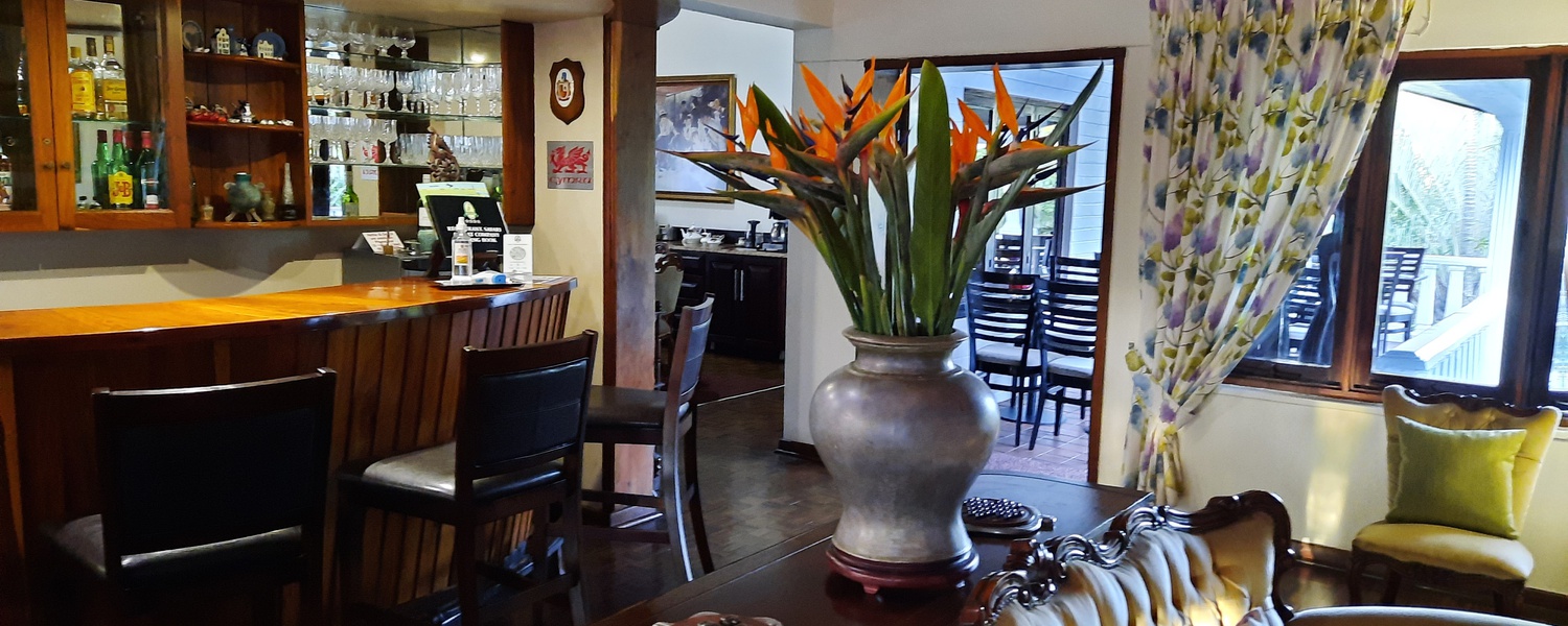 Lounge Bar Dinning room St Lucia Wetlands Guesthouse Flowers